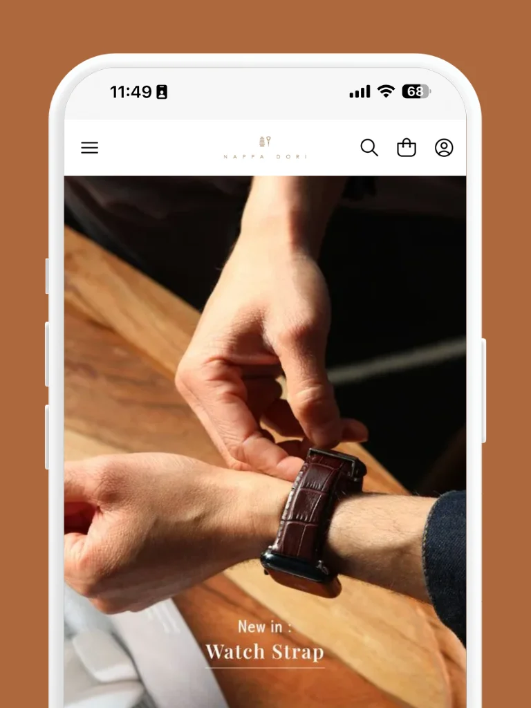 A leather goods storefront on Ooulet showing a watch strap